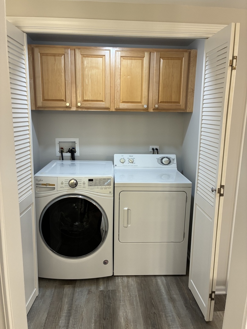 5 West Central Road, Unit 201 Mount Prospect, IL 60056 - Photo 11 of 14 a utility room with wooden floor washer and dryer