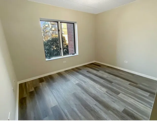 a view of an empty room and window