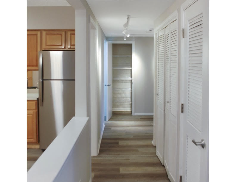 5 West Central Road, Unit 201 Mount Prospect, IL 60056 - Photo 8 of 14 a view of a kitchen from the hallway