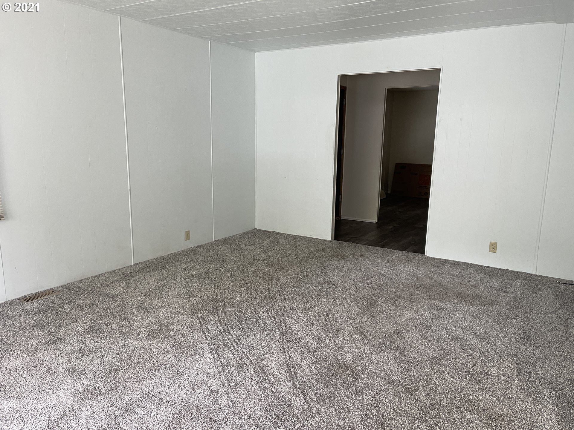 1125 58th Street, Unit SP001 Springfield, OR 97478 - Photo 12 of 28 a view of an empty room and entryway