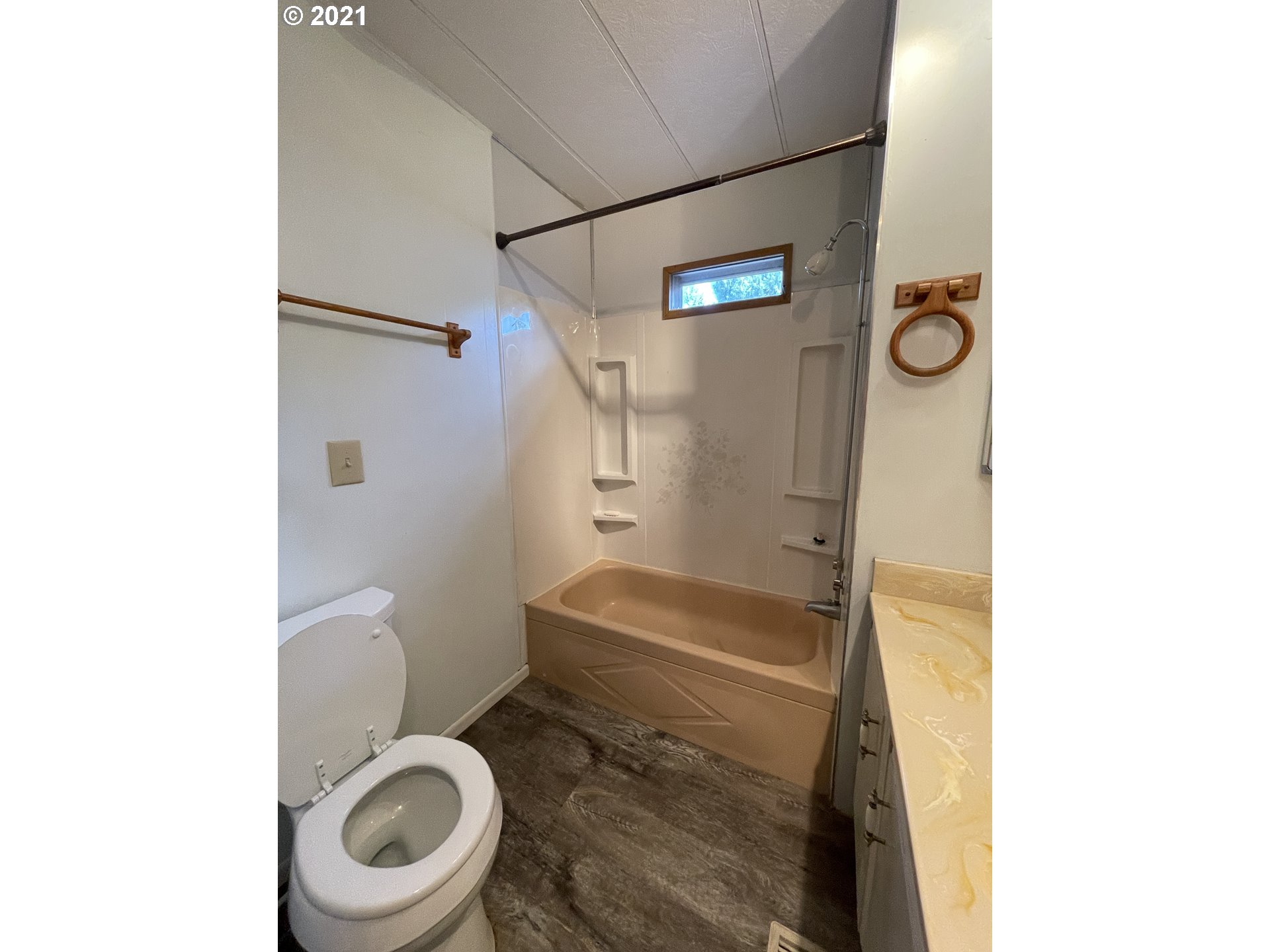 1125 58th Street, Unit SP001 Springfield, OR 97478 - Photo 21 of 28 a bathroom with a toilet and a shower