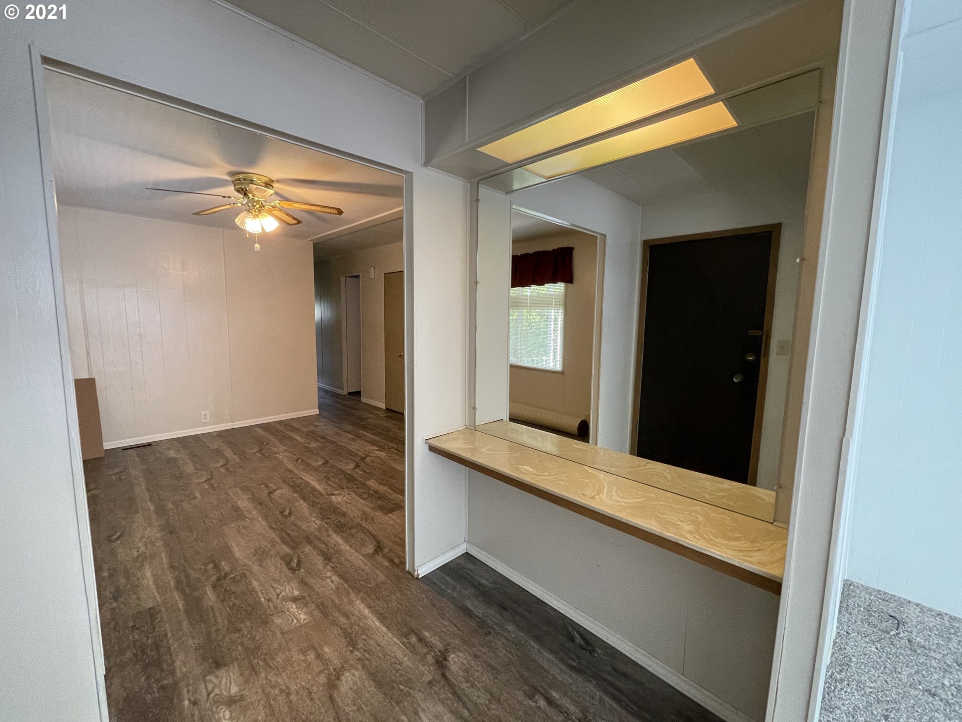 1125 58th Street, Unit SP001 Springfield, OR 97478 - Photo 9 of 28 a view of front door and bedroom