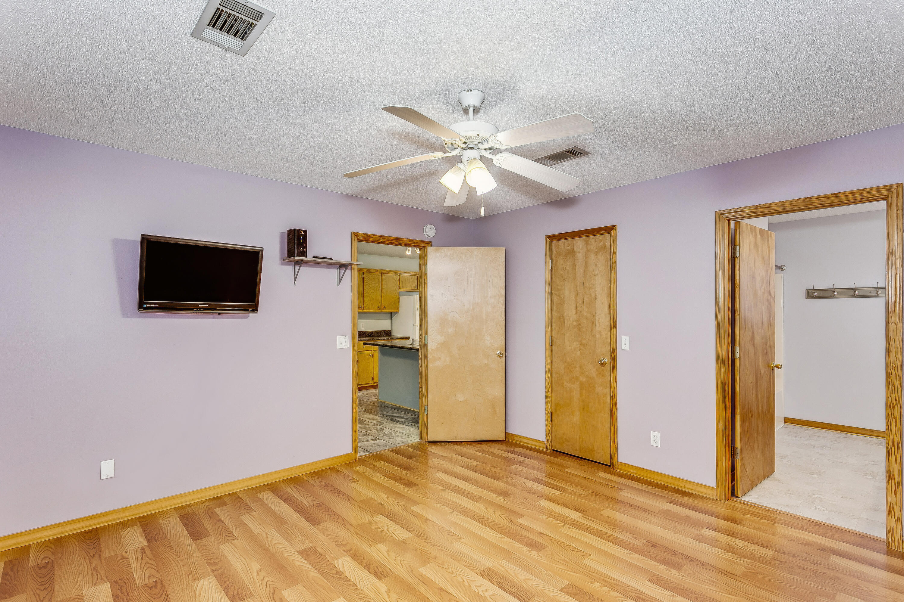 5360 Windham Road Milton, FL 32570 - Photo 12 of 27 a view of a livingroom with a flat screen tv