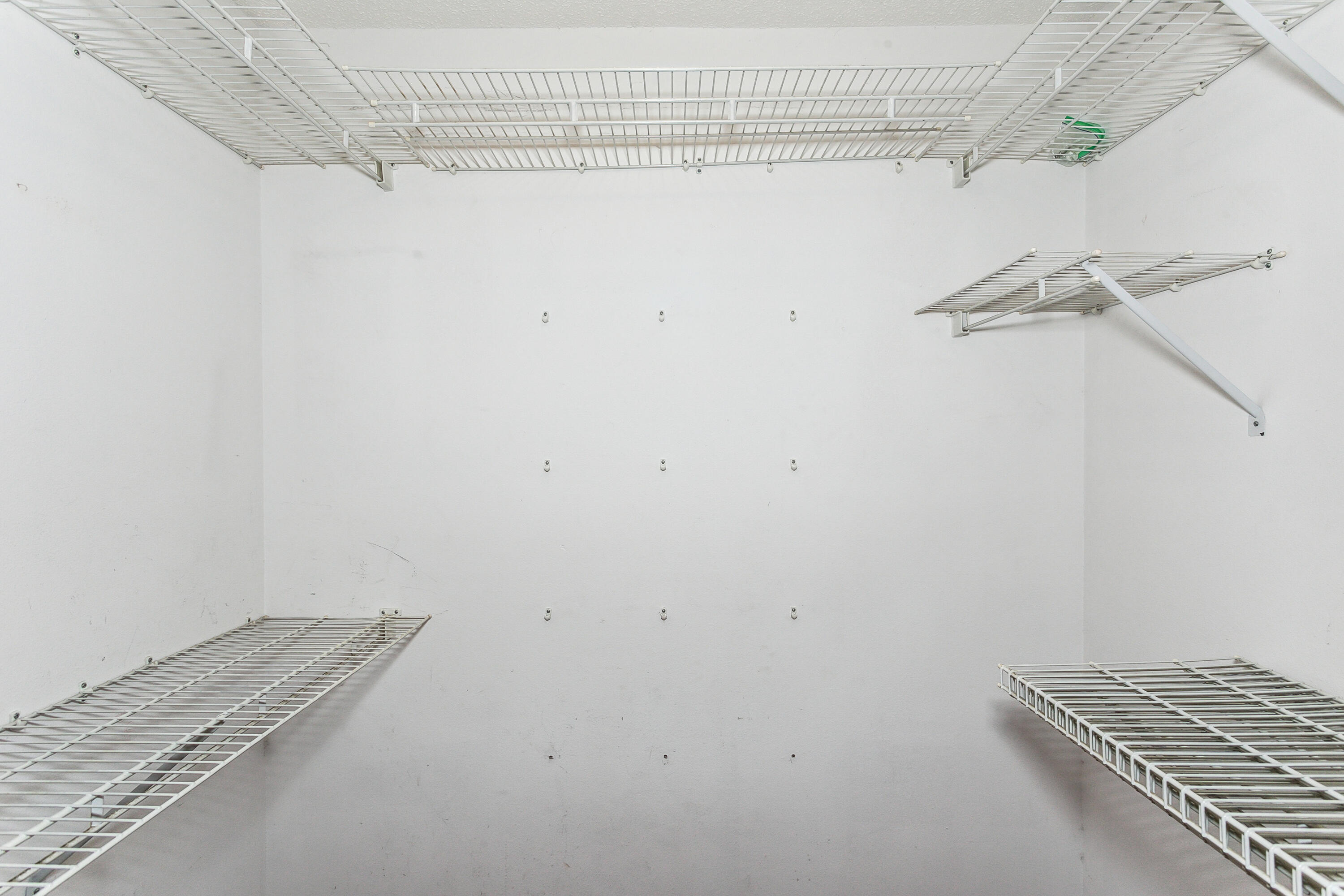 5360 Windham Road Milton, FL 32570 - Photo 15 of 27 a view of a room with racks on the wall