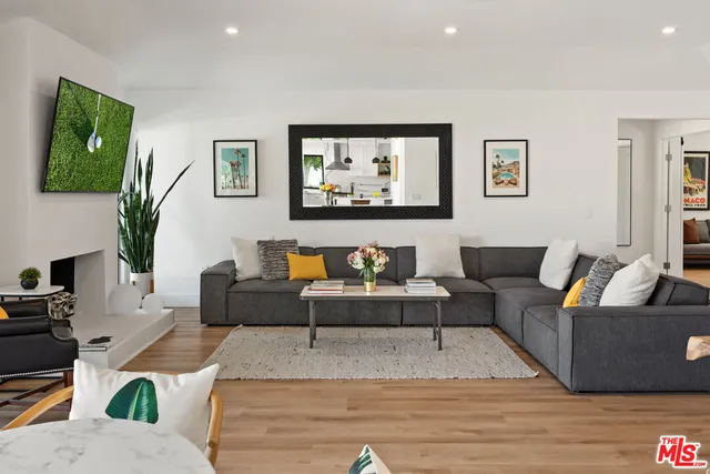 a living room with furniture and a couch