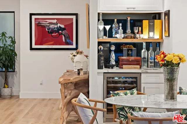 a dining room with table and chairs