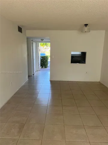 a view of hallway with window