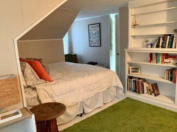 2085 Wilbraham Road Springfield, MA 01129 - Photo 18 of 24 a bedroom with a bed and a book shelf
