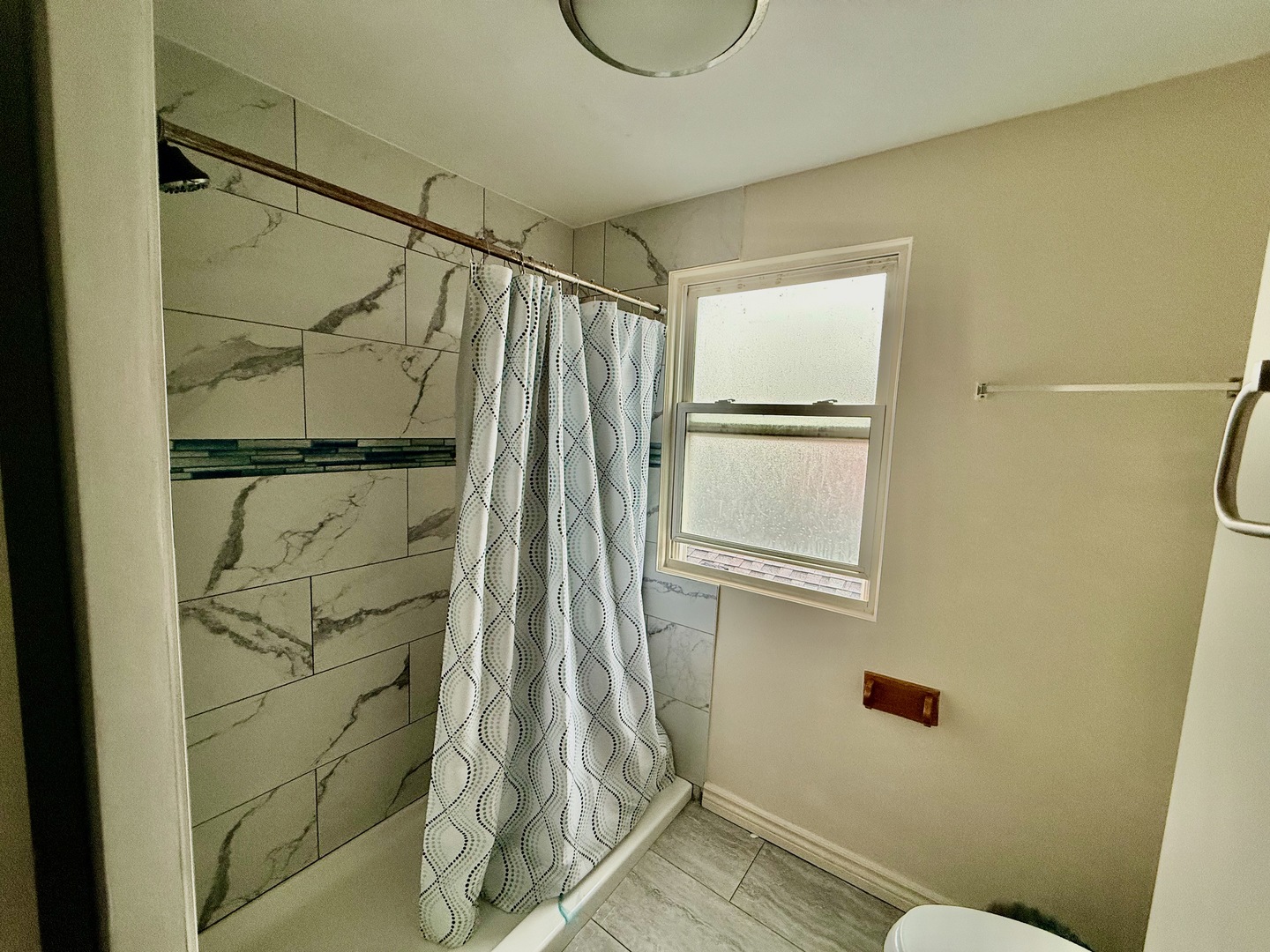 5542 South Nottingham Avenue Chicago, IL 60638 - Photo 11 of 39 a bathroom with a shower toilet and sink