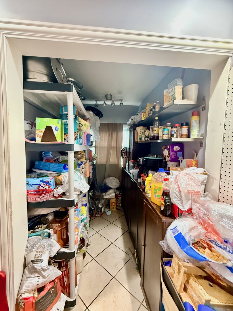 5542 South Nottingham Avenue Chicago, IL 60638 - Photo 24 of 39 a room with storage and utility