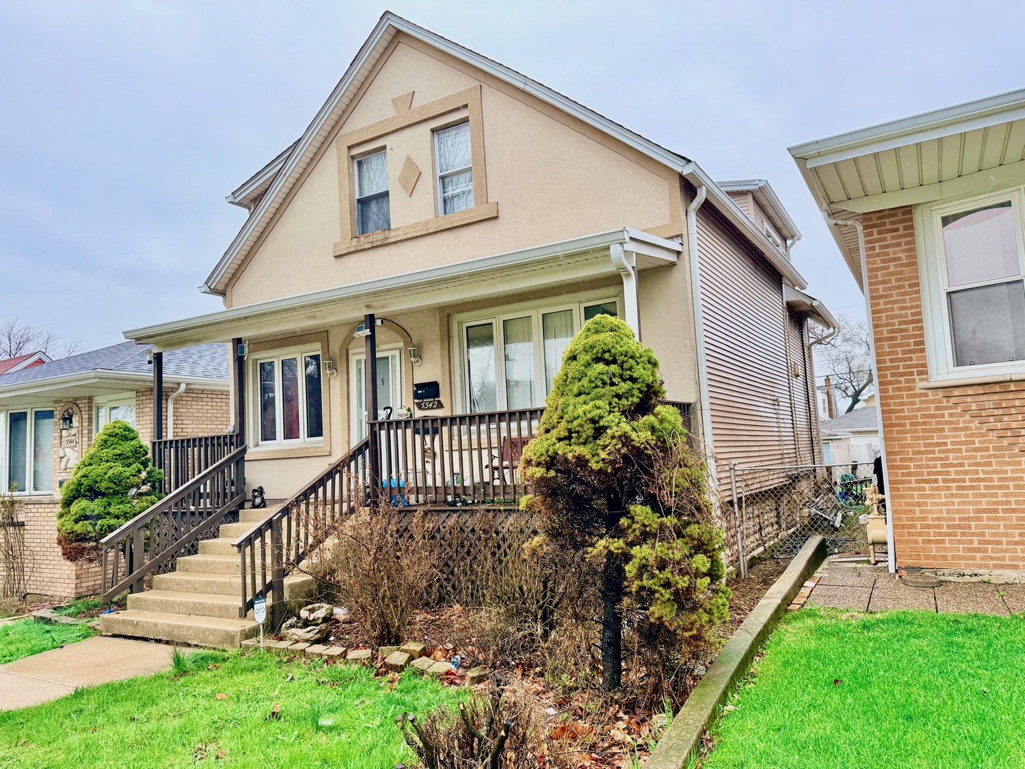 5542 South Nottingham Avenue Chicago, IL 60638 - Photo 3 of 39 front view of a house with a yard