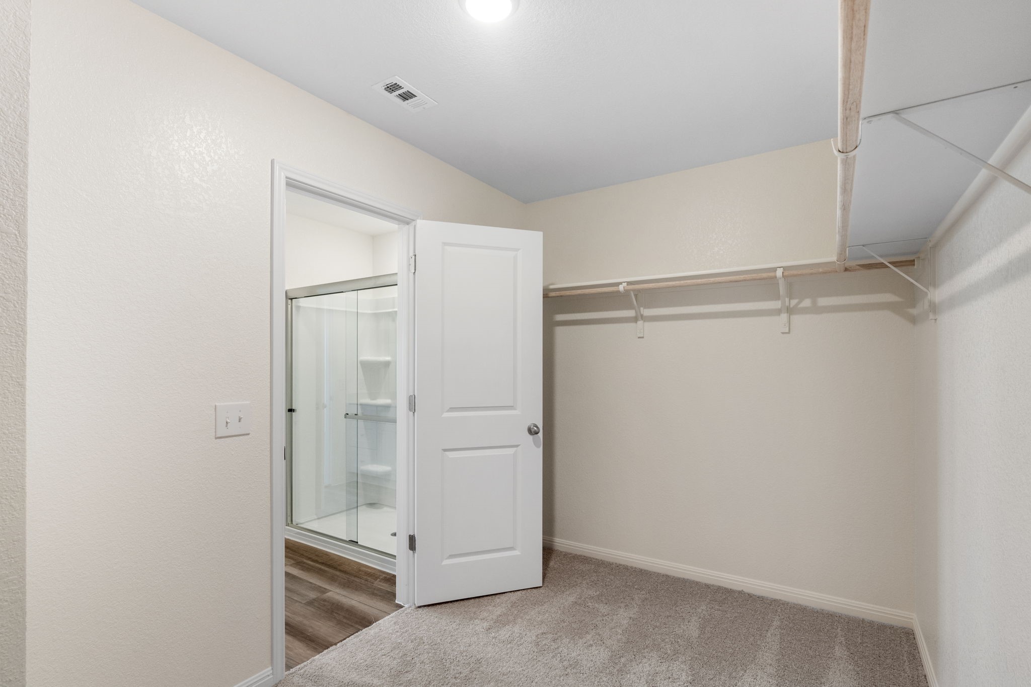 513 Thistle Lane Maxwell, TX 78656 - Photo 16 of 36 Walk-in closet in primary bathroom