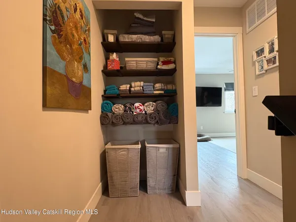 a kitchen with stainless steel appliances granite countertop a refrigerator and a stove
