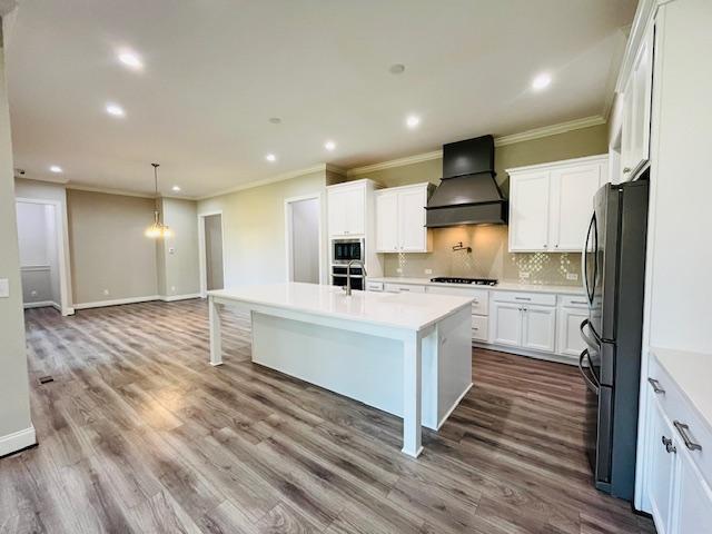 1717 Banks View Drive Raleigh, NC 27603 - Photo 14 of 33 a kitchen with white cabinets and refrigerator