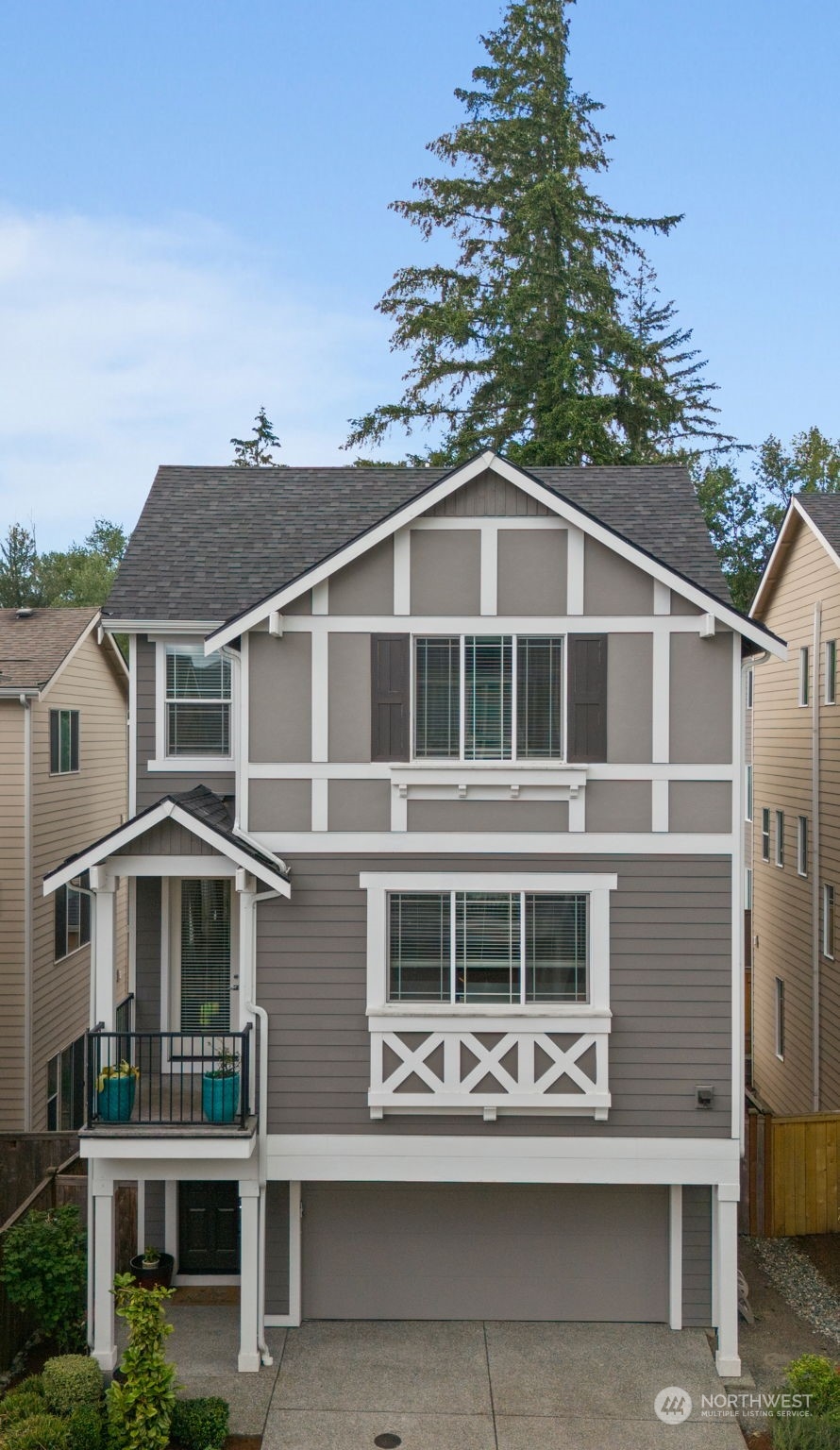 19732 Meridian Place West Bothell, WA 98012 - Photo 1 of 20 a front view of a house with a yard