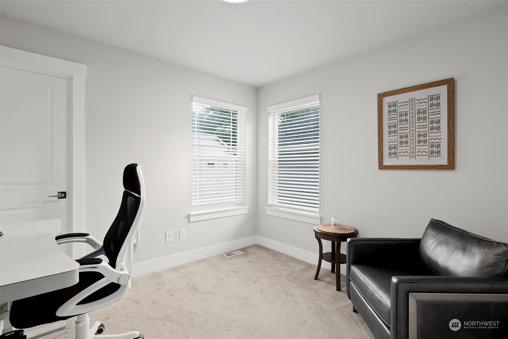 19732 Meridian Place West Bothell, WA 98012 - Photo 14 of 20 a view of a livingroom with workspace and a window