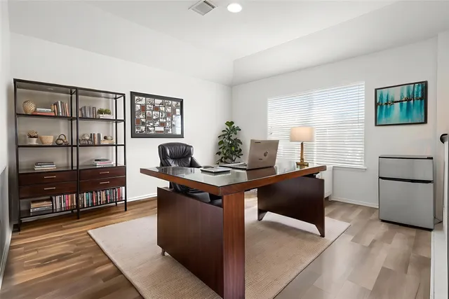 a kitchen with a stove and a cabinets
