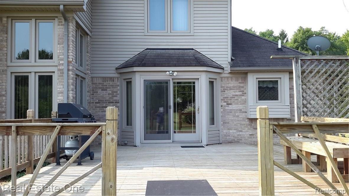 8625 35 Mile Road Romeo, MI 48065 - Photo 35 of 46 Back deck, perfect for relaxing and taking in the scenery