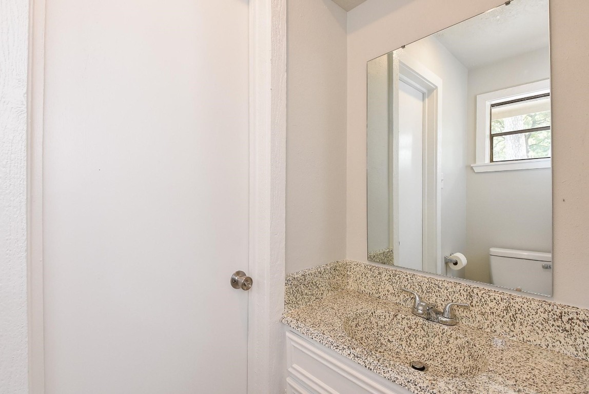 12713 Roy Harris Loop Conroe, TX 77306 - Photo 24 of 41 a view of a bedroom
