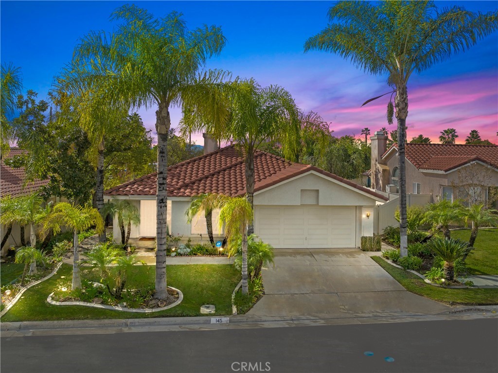 145 Cape Elizabeth Way Riverside, CA 92506 - Photo 1 of 1 a front view of a house with a yard