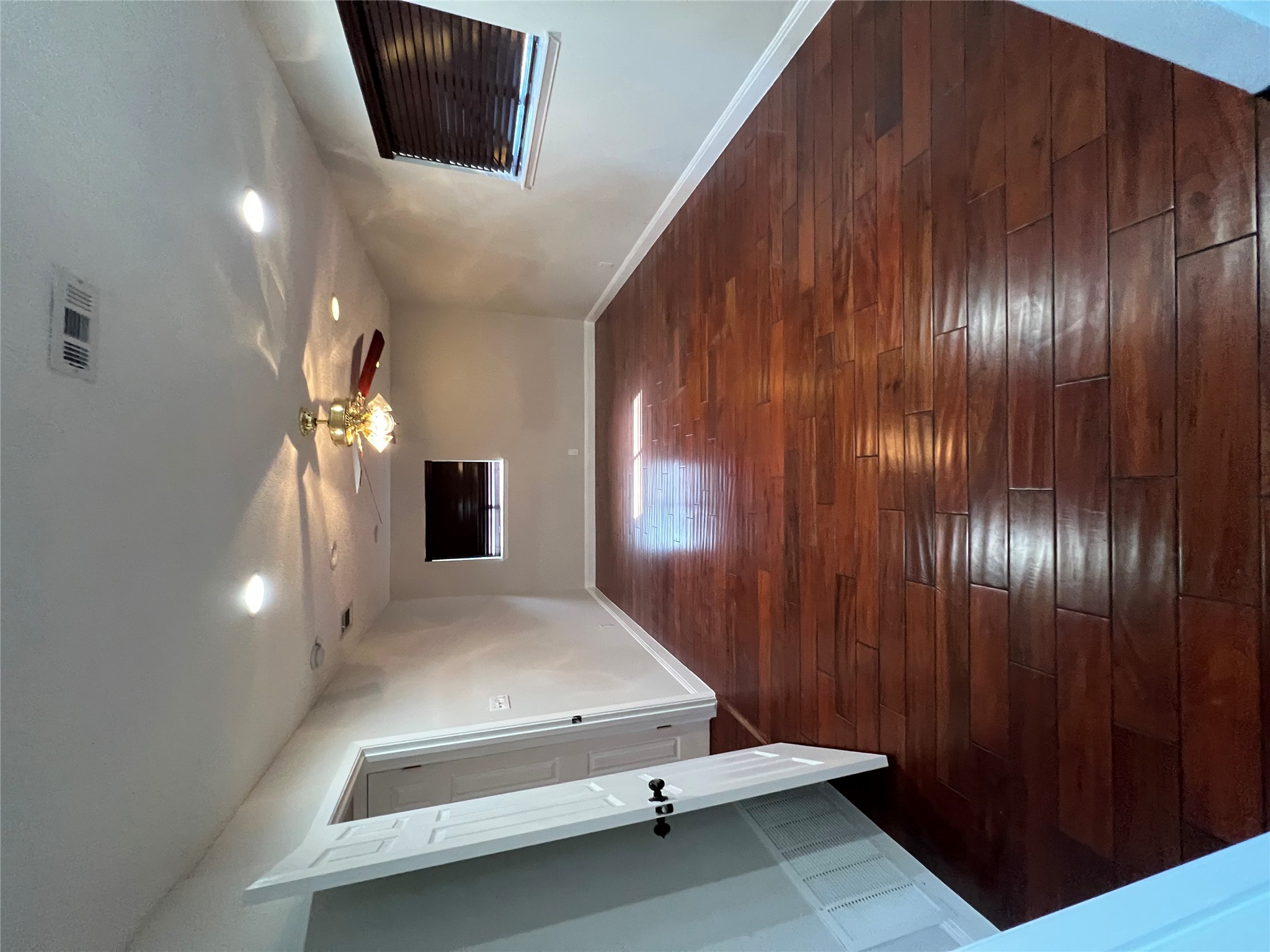 4500 Woodmoor Circle Austin, TX 78721 - Photo 5 of 6 Unfurnished room with dark wood-style flooring, ceiling fan, and recessed lighting