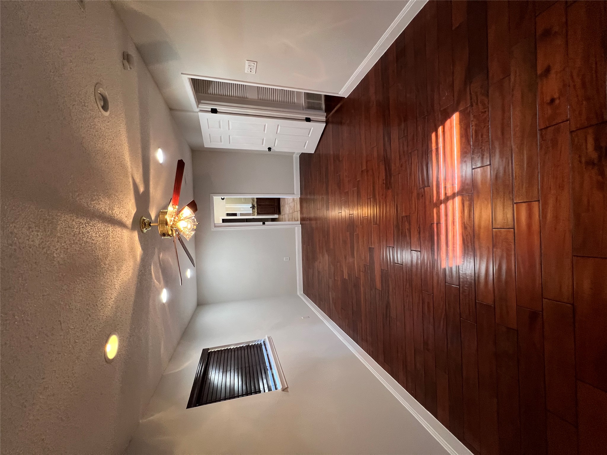 4500 Woodmoor Circle Austin, TX 78721 - Photo 6 of 6 Unfurnished room featuring recessed lighting, a textured ceiling, dark wood-style floors, and a ceiling fan