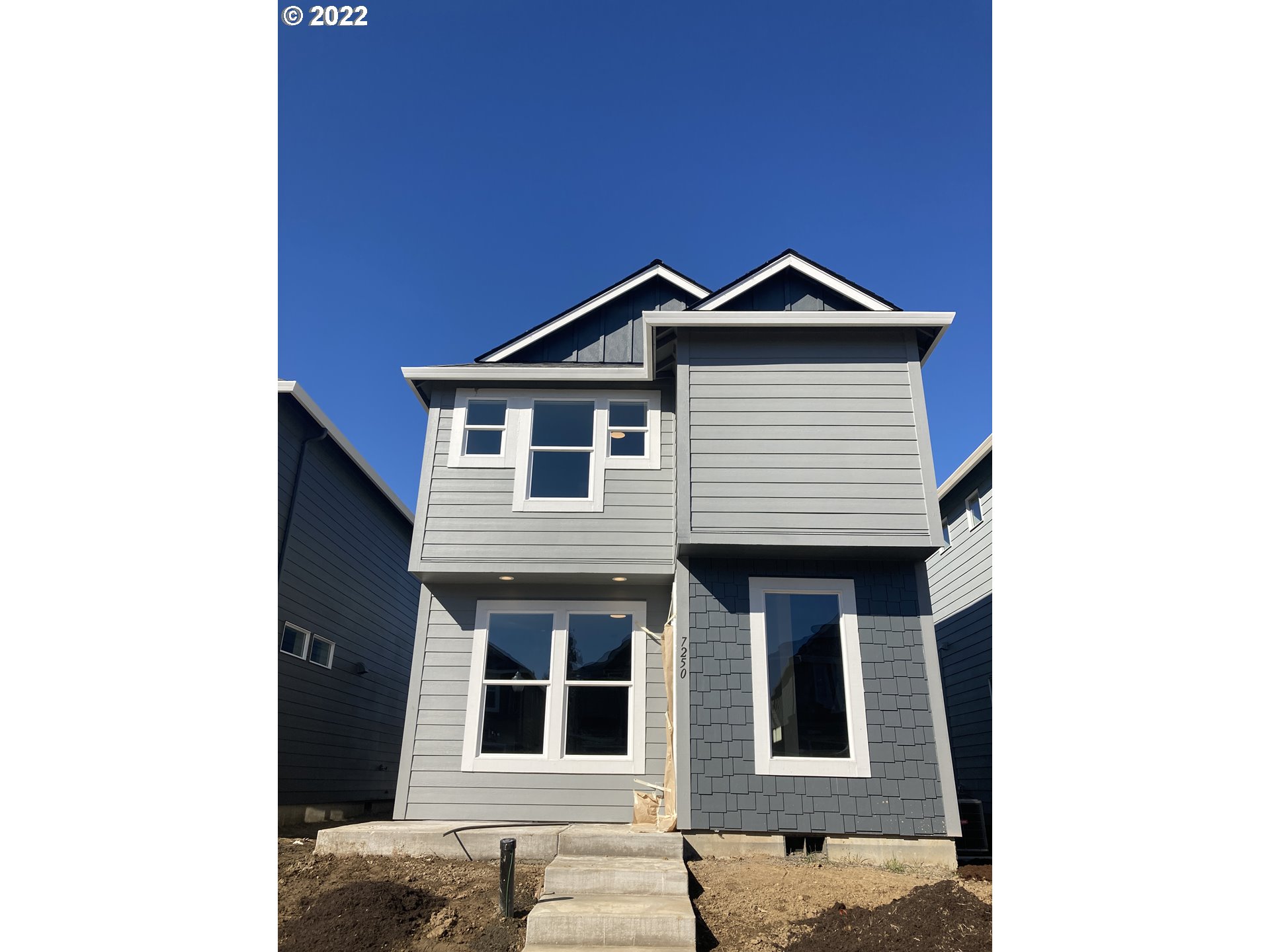 7250 South Ridge Way Ridgefield, WA 98642 - Photo 1 of 16 a house view with a outdoor space