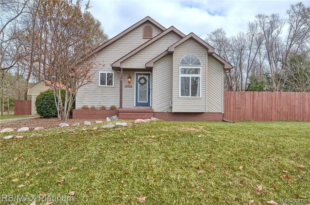 10328 Antcliff Road Fowlerville, MI 48836 - Photo 1 of 23 FRONT