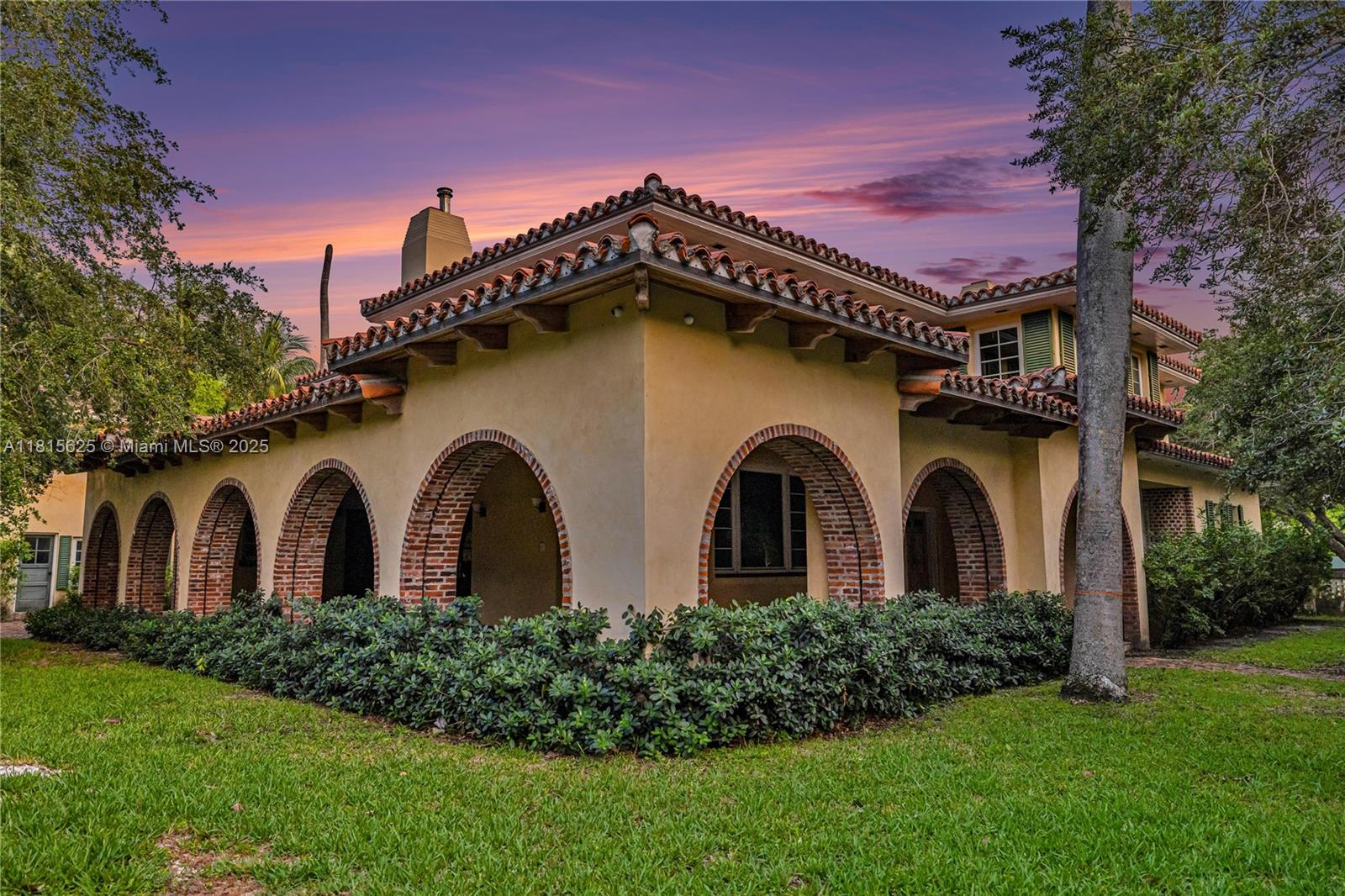 5905 North Bay Road Miami Beach, FL 33140 - Photo 5 of 13 Side of structure today at twilight