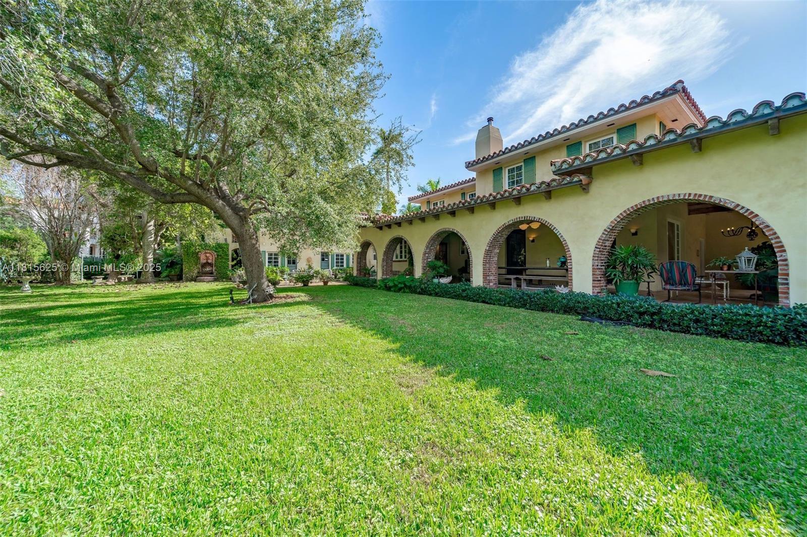 5905 North Bay Road Miami Beach, FL 33140 - Photo 6 of 13 TPresent-day view of the residence, set on more than 17,000 square feet of verdant tropical landscape