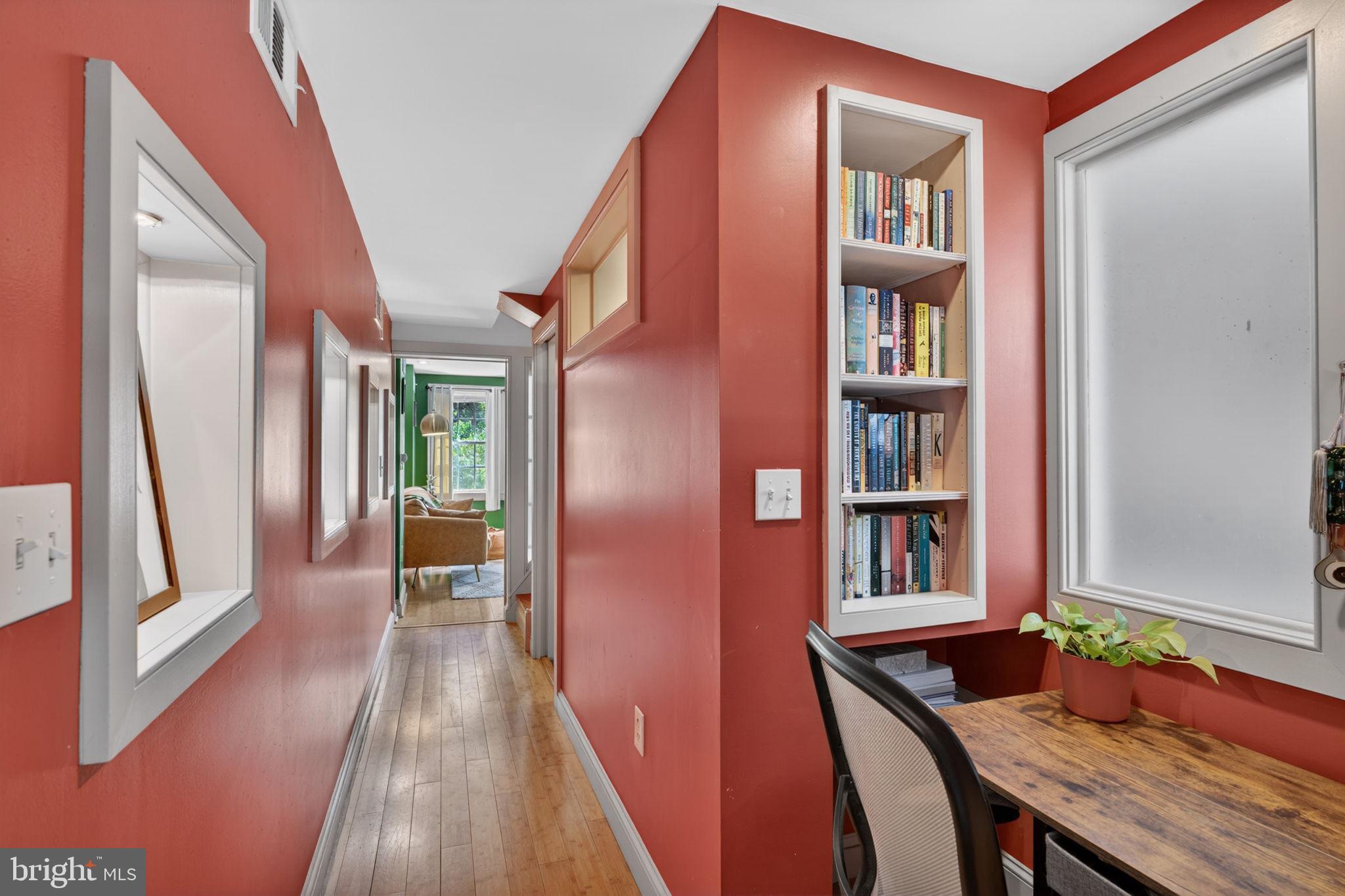 18 South Washington Street Baltimore, MD 21231 - Photo 21 of 57 a reading room with furniture book shelf and wooden floor