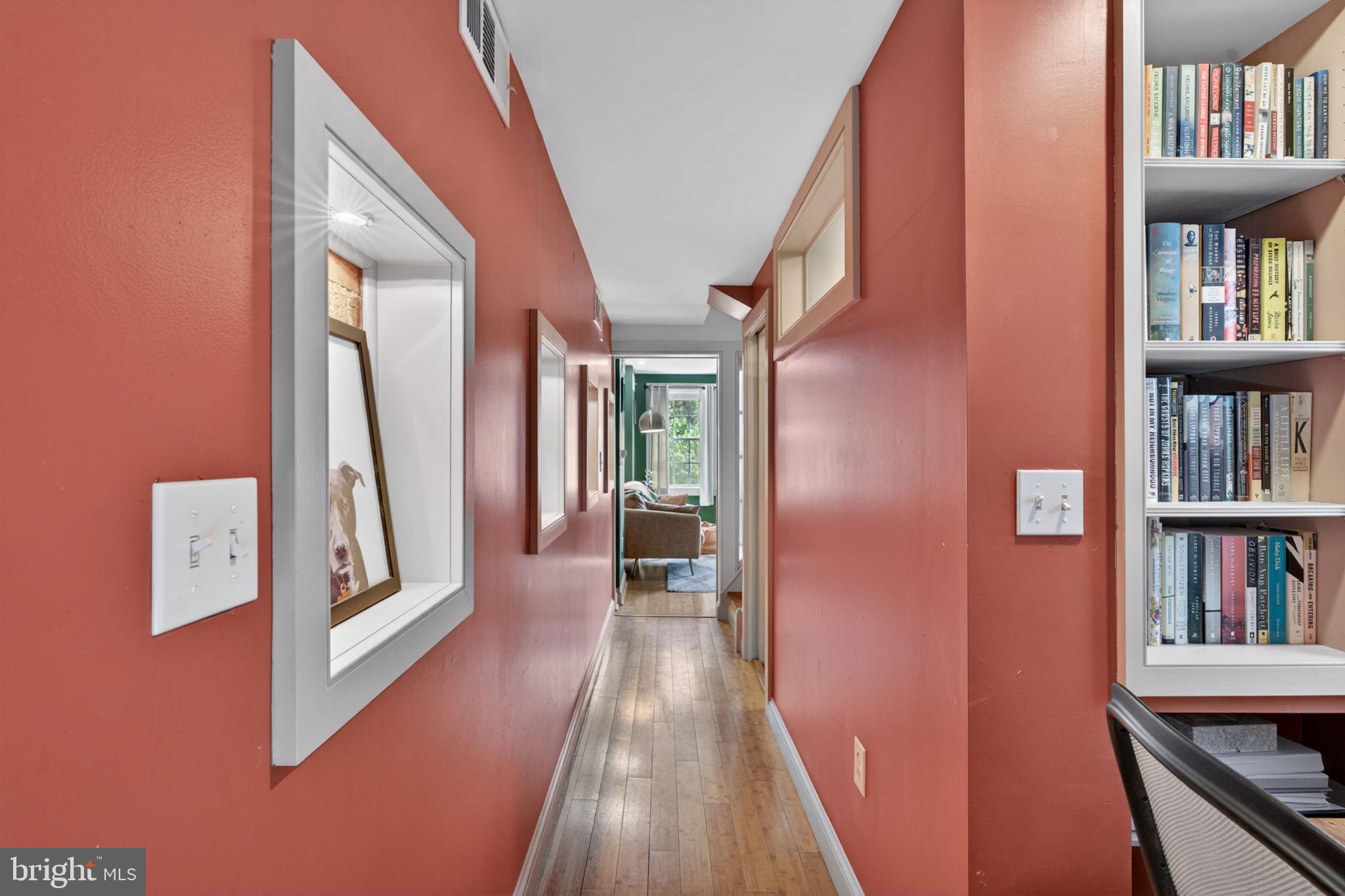18 South Washington Street Baltimore, MD 21231 - Photo 22 of 57 a view of a hallway with wooden floor and entryway