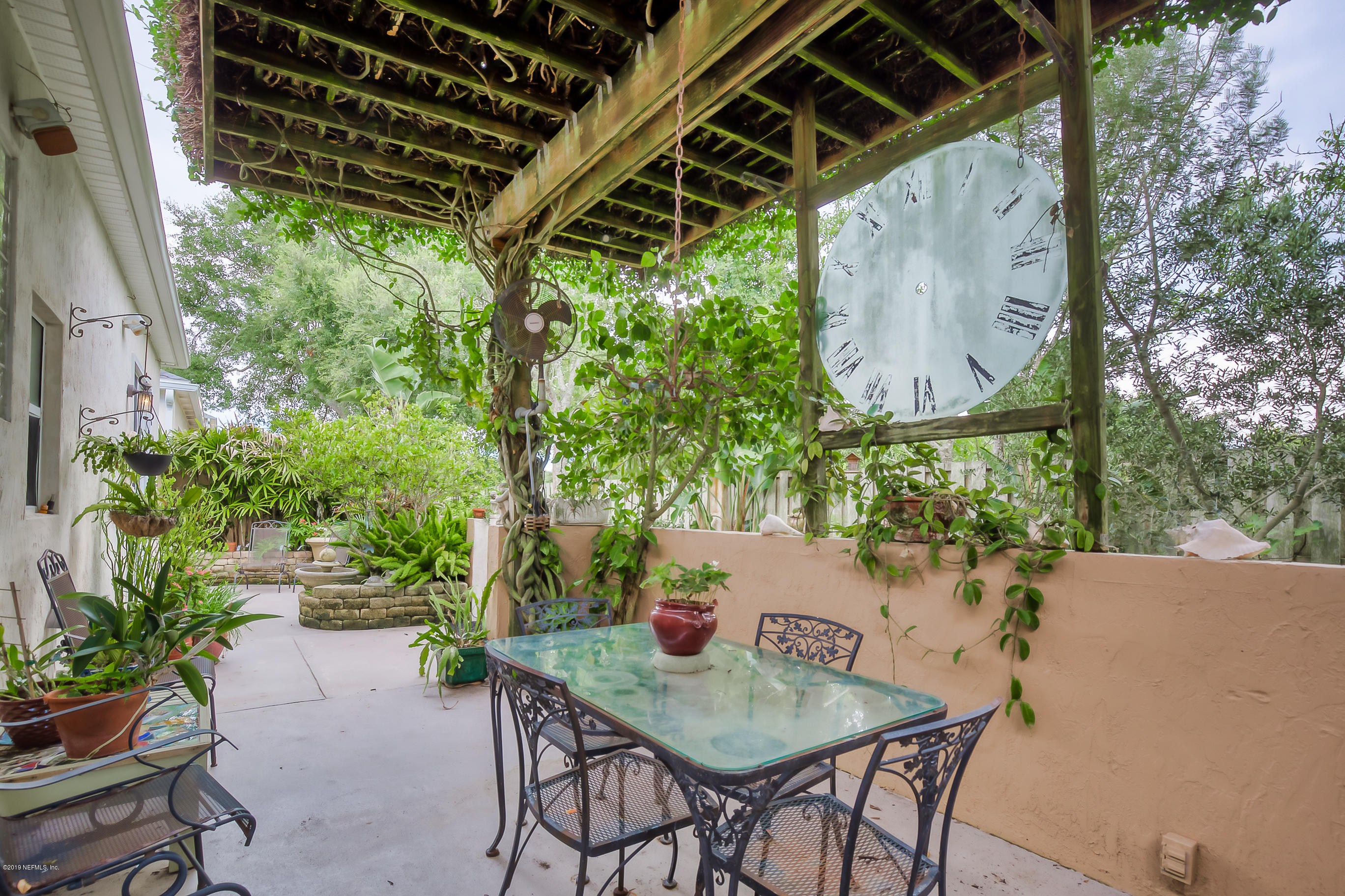 200 Cedar Ridge Circle St. Augustine, FL 32080 - Photo 20 of 41 a backyard of a house with seating space