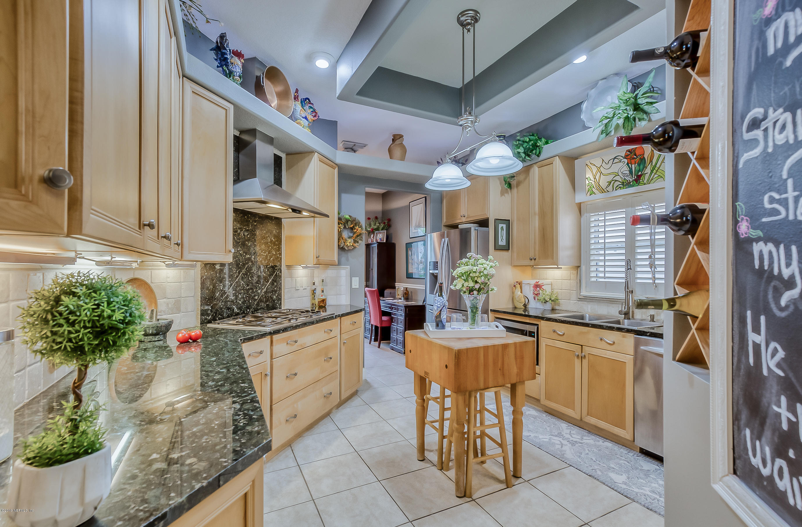 200 Cedar Ridge Circle St. Augustine, FL 32080 - Photo 24 of 41 a kitchen with counter space cabinets and appliances