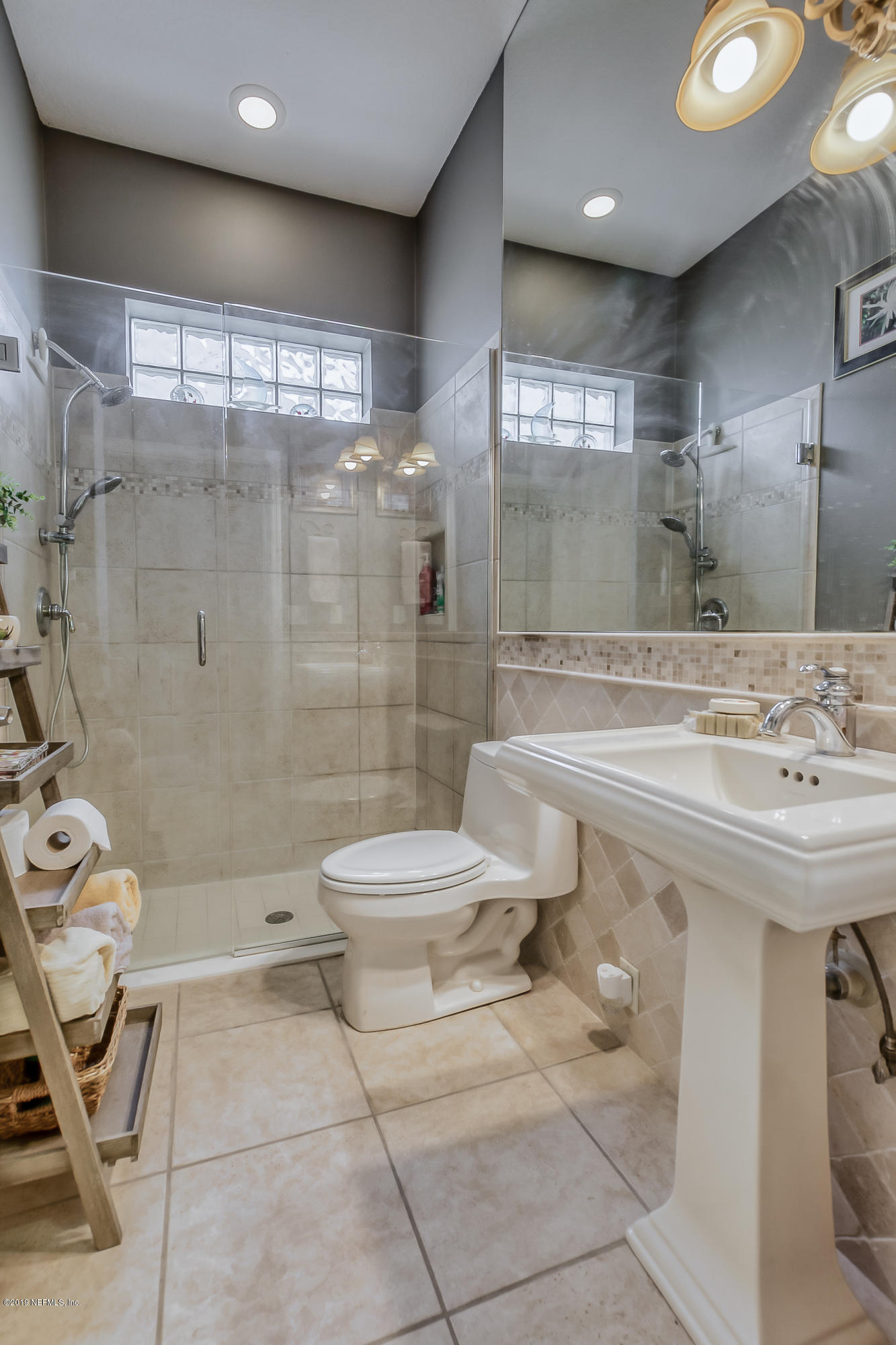 200 Cedar Ridge Circle St. Augustine, FL 32080 - Photo 27 of 41 a bathroom with a sink toilet and shower