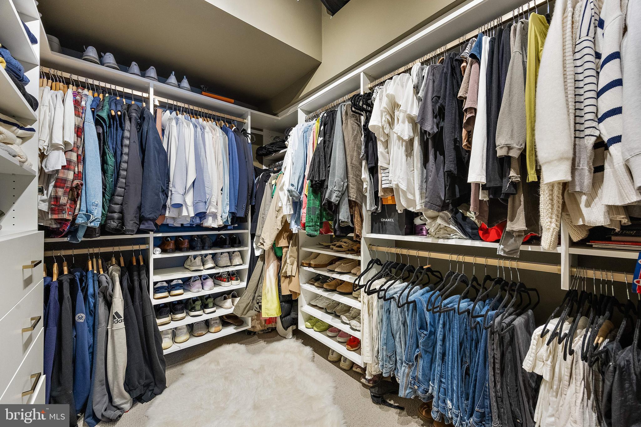 49 Bancroft Mills Road, Unit 2B Wilmington, DE 19806 - Photo 15 of 18 a view of walk in closet with clothes and shoes