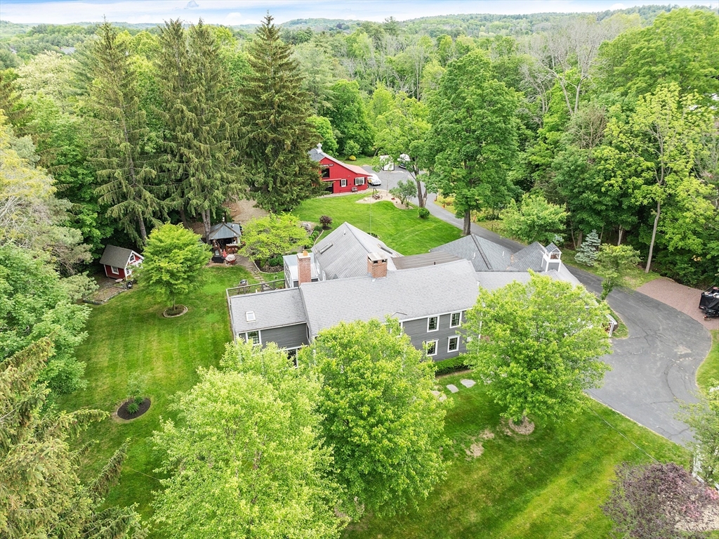 10 Garrison Street Groveland, MA 01834 - Photo 2 of 42 an aerial view of residential house with outdoor space and trees all around