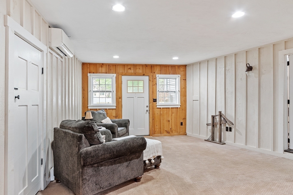10 Garrison Street Groveland, MA 01834 - Photo 31 of 42 a living room with furniture and a window