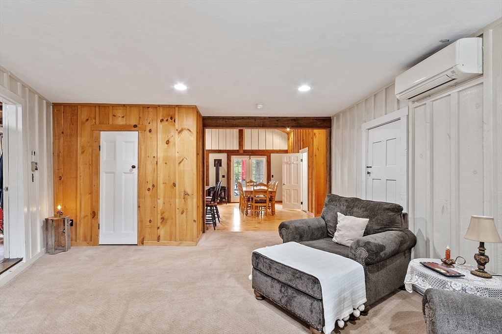 10 Garrison Street Groveland, MA 01834 - Photo 32 of 42 a living room with a couch and a window
