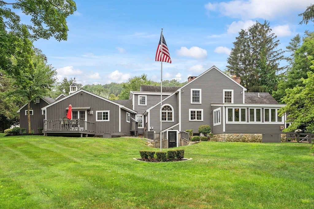 10 Garrison Street Groveland, MA 01834 - Photo 35 of 42 a front view of a house with a yard