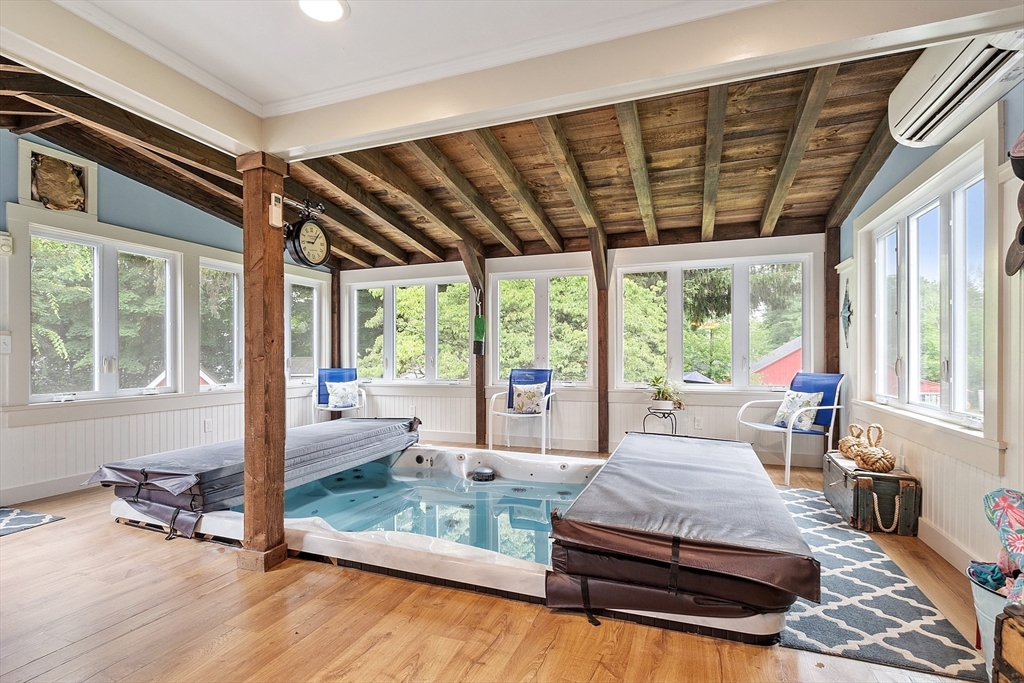 10 Garrison Street Groveland, MA 01834 - Photo 8 of 42 a bedroom with furniture and large windows