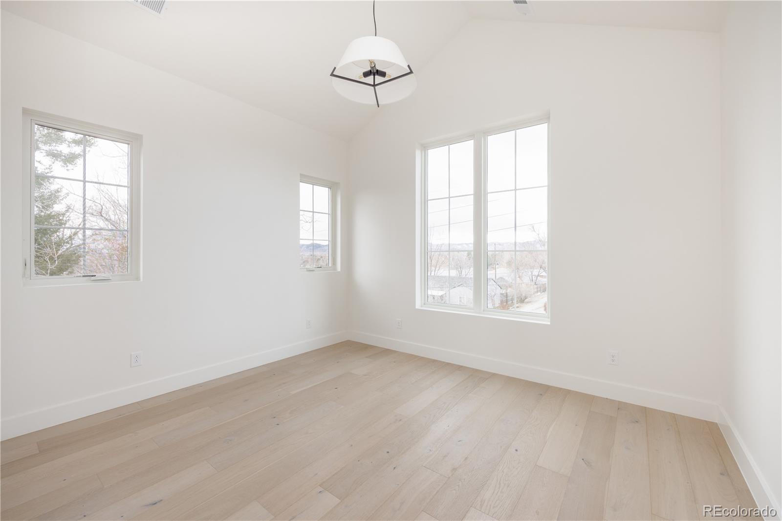 3076 Fenton Street Wheat Ridge, CO 80214 - Photo 27 of 37 a view of an empty room with a window