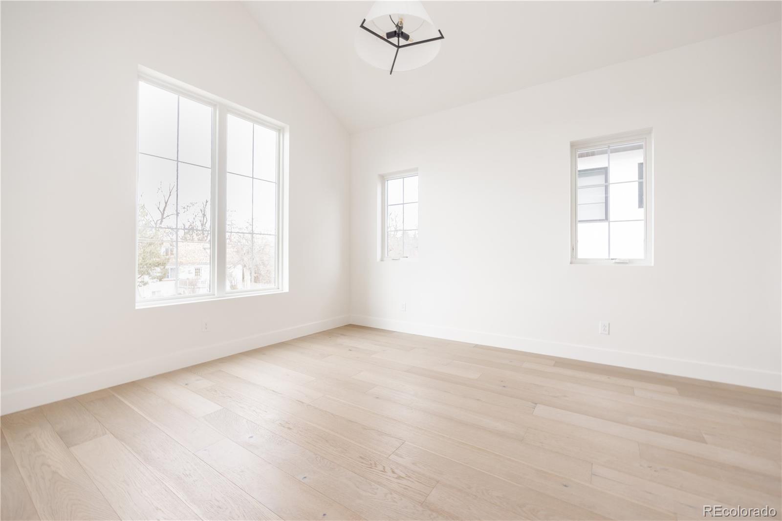 3076 Fenton Street Wheat Ridge, CO 80214 - Photo 31 of 37 an empty room with windows and closet
