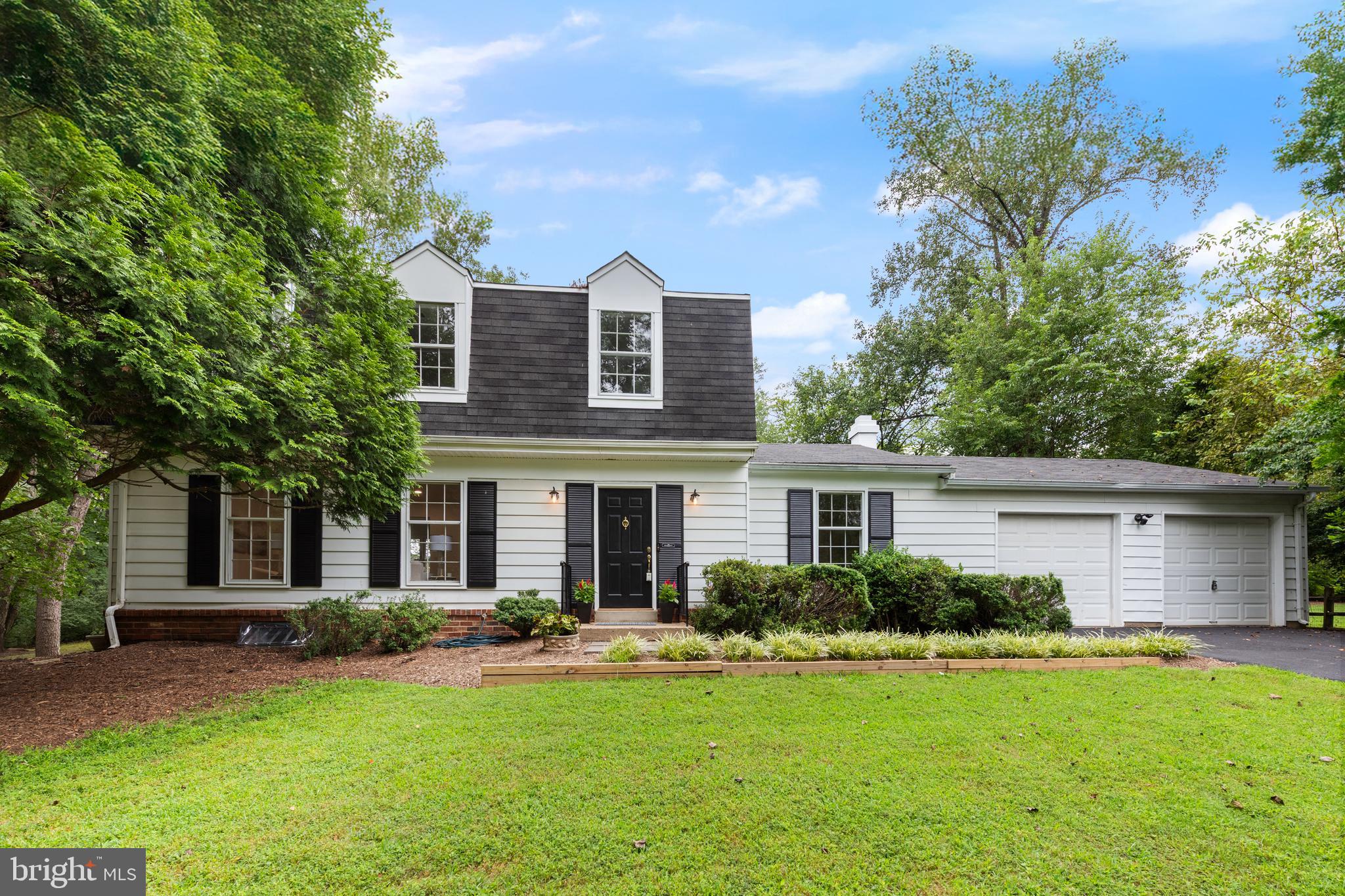 1802 Cranberry Lane Reston, VA 20191 - Photo 1 of 75 a front view of house with yard and green space