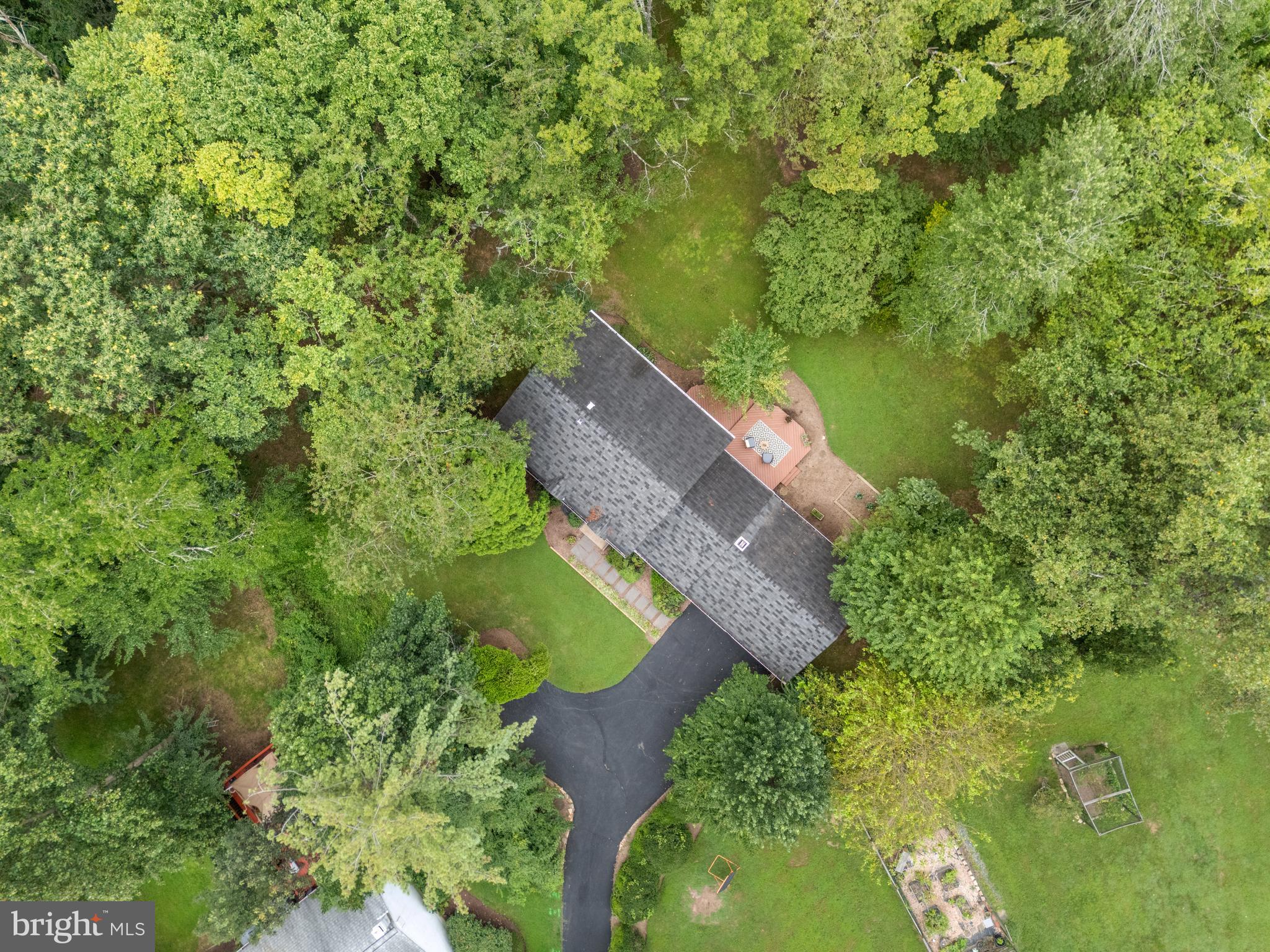 1802 Cranberry Lane Reston, VA 20191 - Photo 6 of 75 an aerial view of a house with a yard