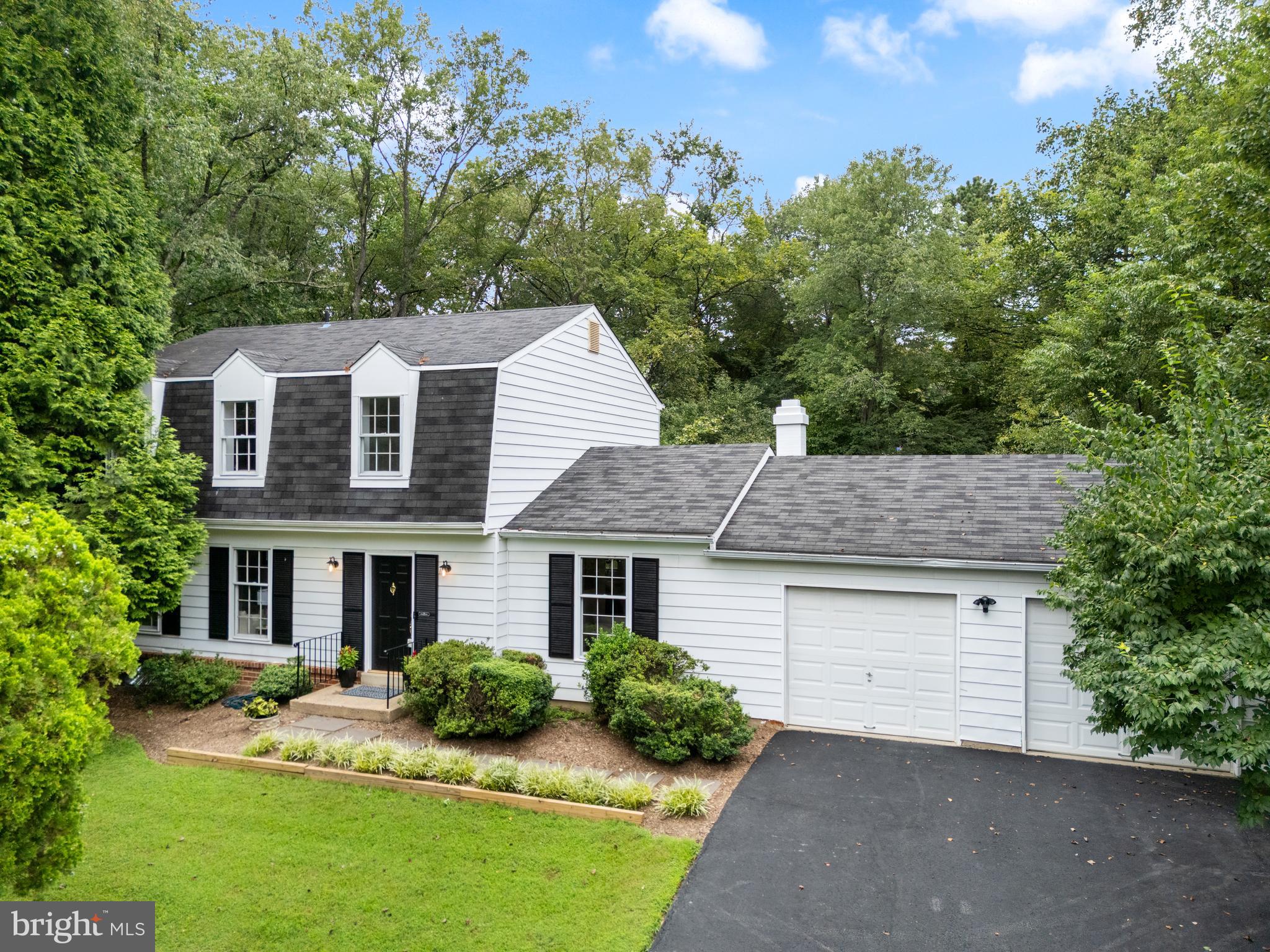 1802 Cranberry Lane Reston, VA 20191 - Photo 8 of 75 a aerial view of a house with yard and green space