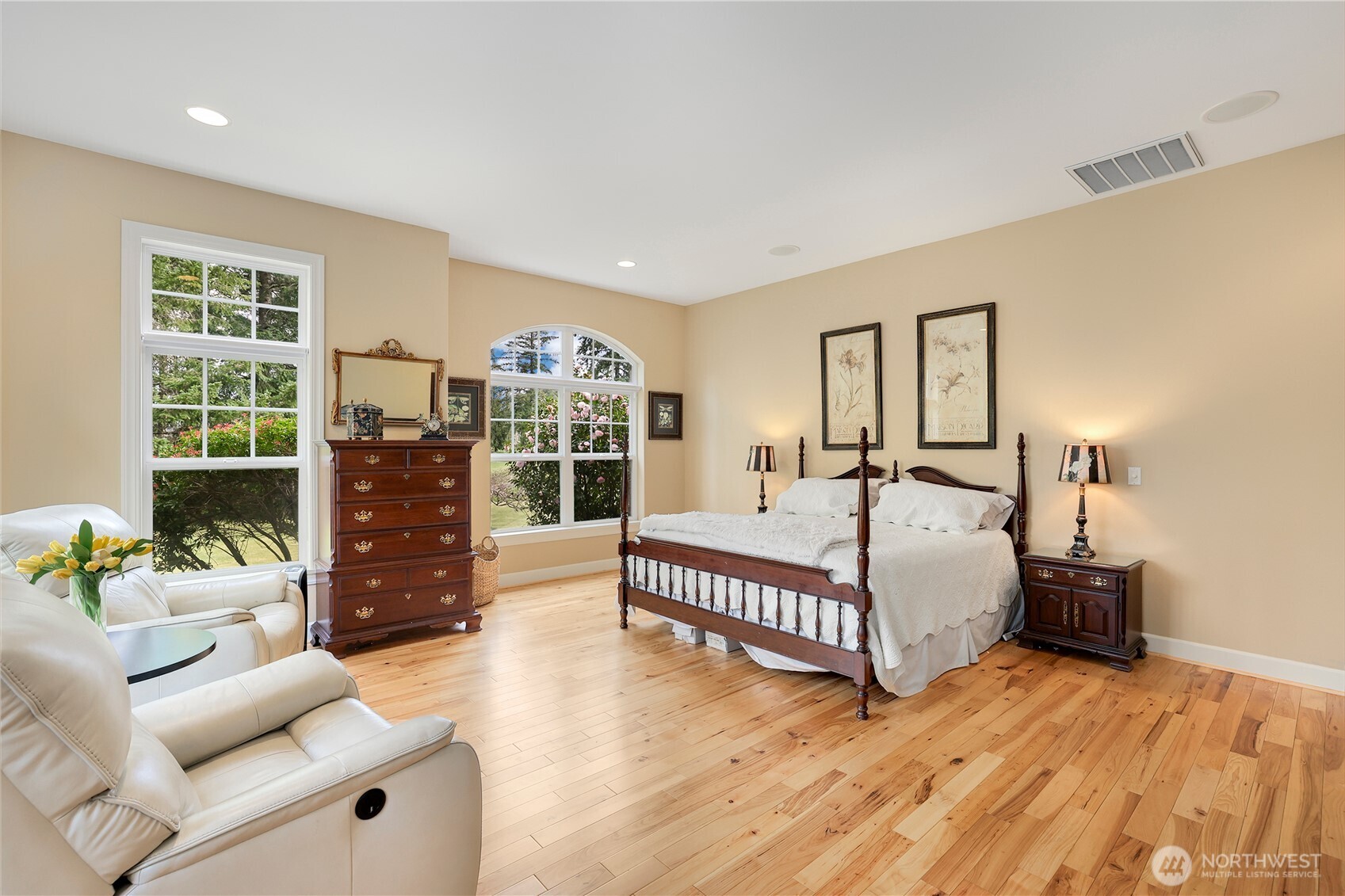 7007 Muirkirk Lane Southwest Port Orchard, WA 98367 - Photo 11 of 40 a spacious bedroom with a bed and a couch
