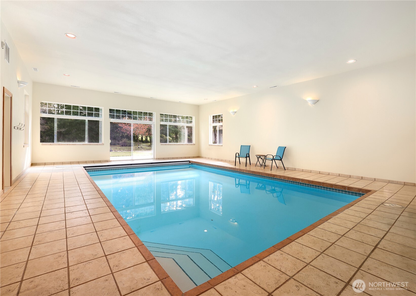 7007 Muirkirk Lane Southwest Port Orchard, WA 98367 - Photo 15 of 40 a view of swimming pool with outdoor space