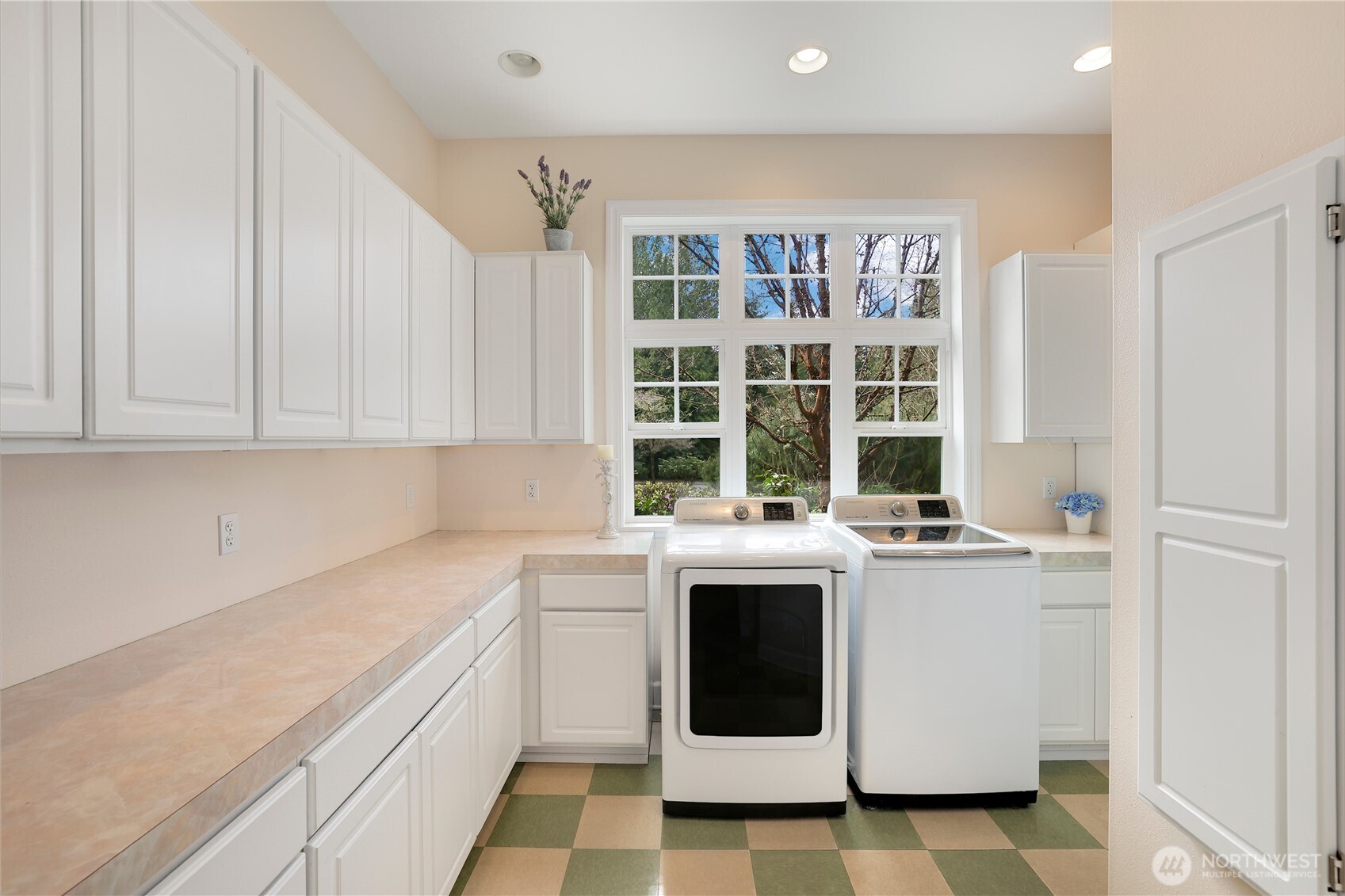 7007 Muirkirk Lane Southwest Port Orchard, WA 98367 - Photo 16 of 40 a view of a kitchen with a stove top oven
