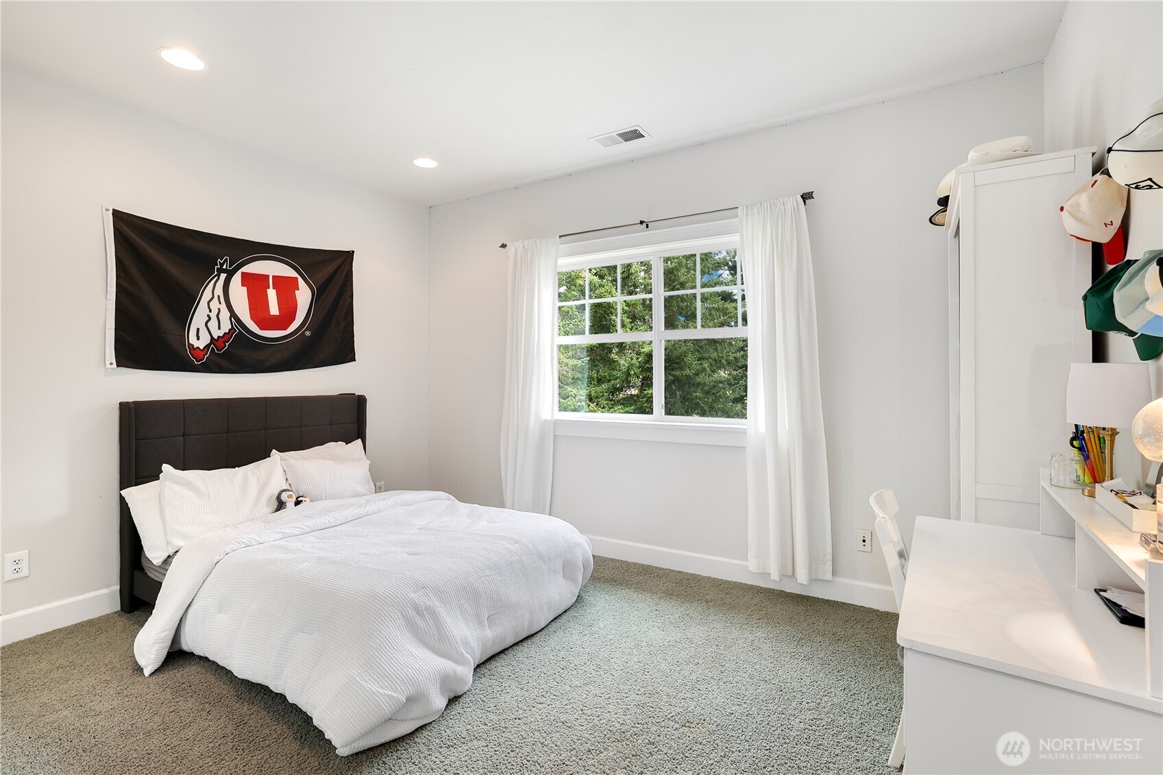 7007 Muirkirk Lane Southwest Port Orchard, WA 98367 - Photo 23 of 40 a bedroom with a bed and a window